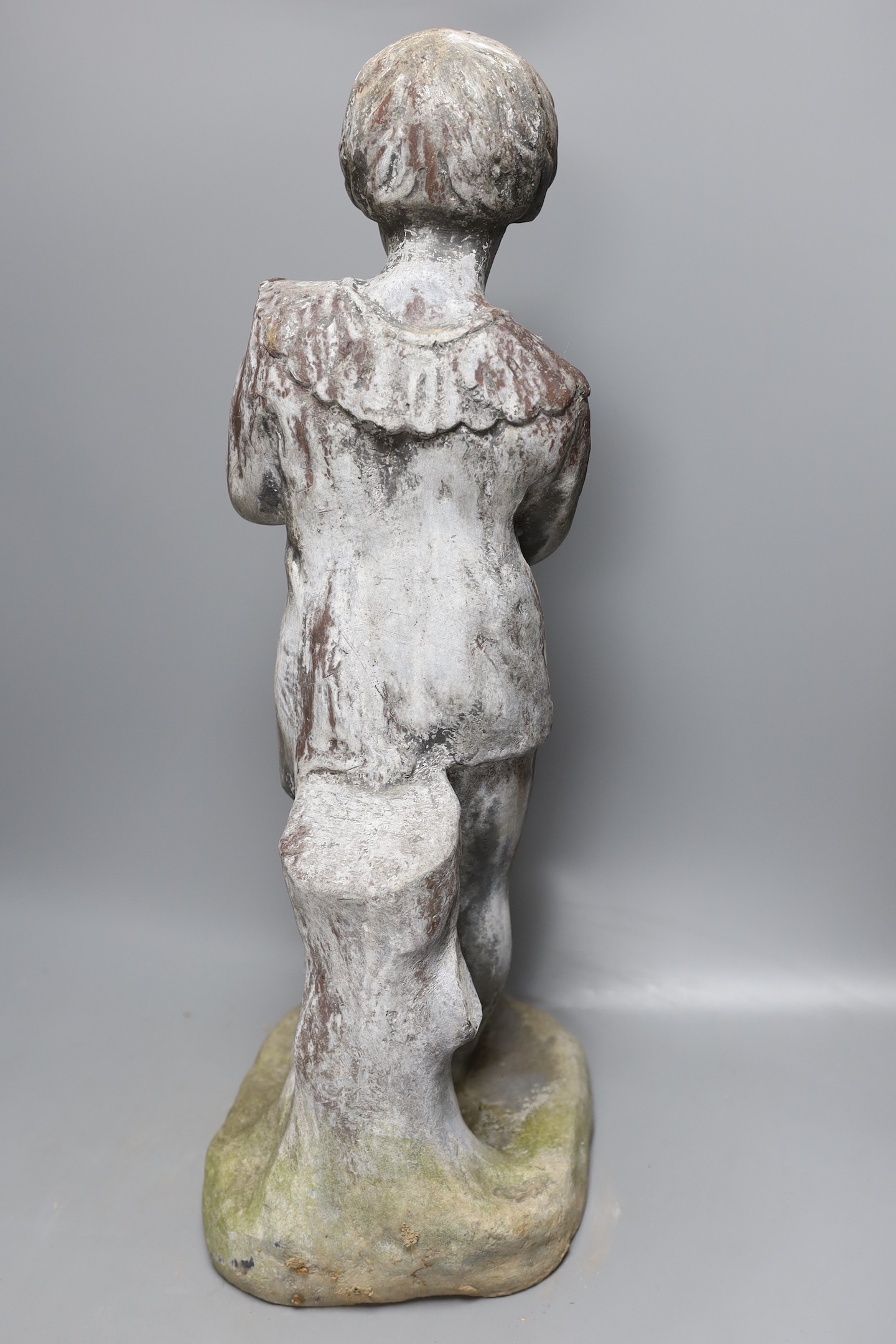 A 20th century lead garden statue of Pan, 58cms high.